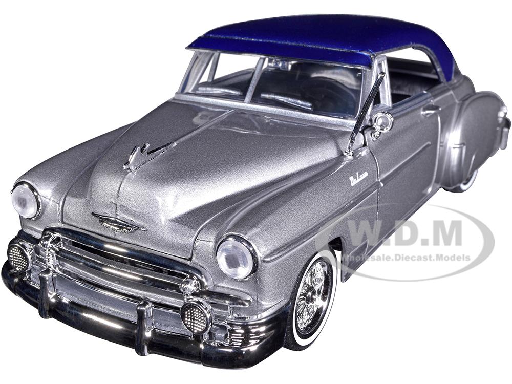 1950 Chevrolet Bel Air Lowrider Silver Metallic with Blue Metallic Top "Get Low" Series 1/24 Diecast Model Car by Motormax