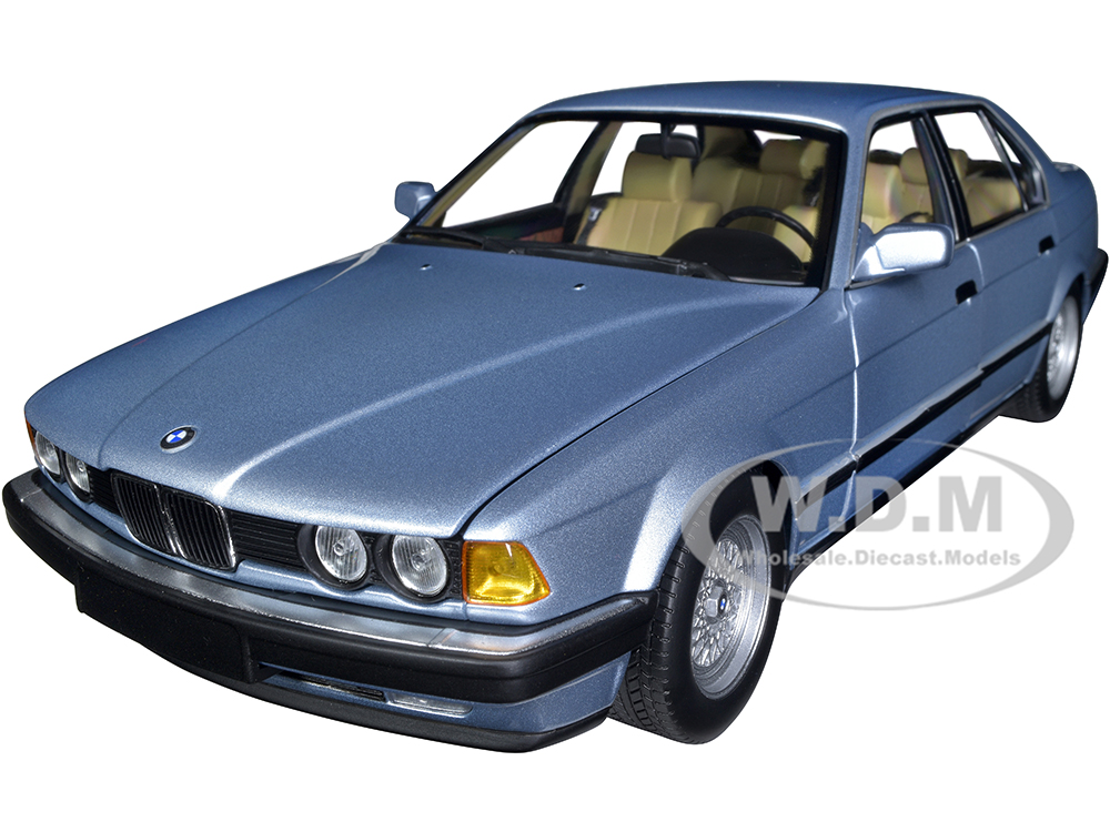 1986 BMW 730i (E32) Light Blue Metallic 1/18 Diecast Model Car by Minichamps