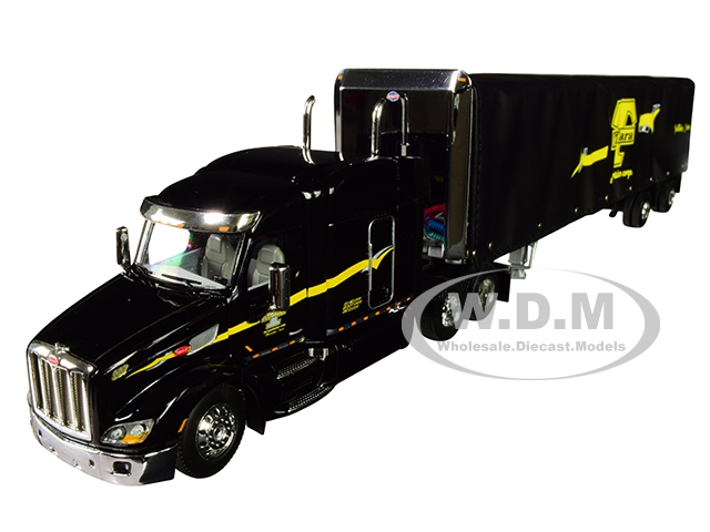 Image of Peterbilt Model 579 with 72" Mid-Roof Sleeper Cab and 53 Utility Roll Tarp Spread-Axle Trailer "TanTara Transportation Corp." Black 1/64 Diecast Mode