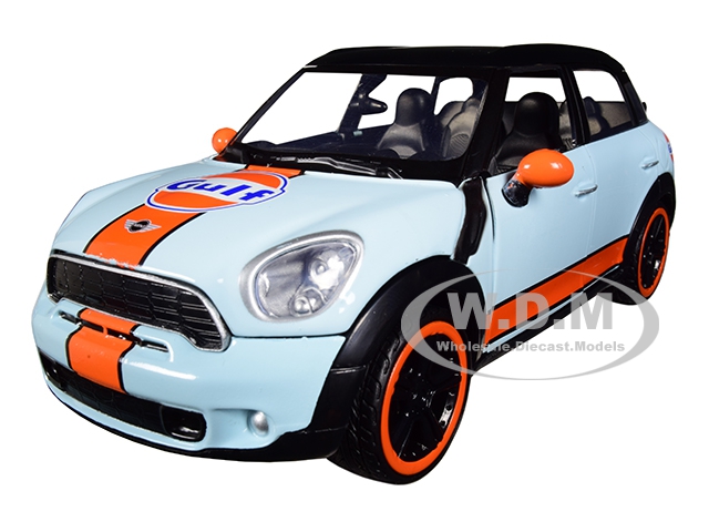 Mini Cooper S Countryman With "gulf" Livery Light Blue With Orange Stripe And Black Top 1/24 Diecast Model Car By Motormax