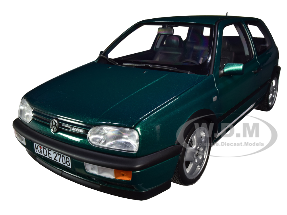 Image of 1996 Volkswagen Golf VR6 Green Metallic 1/18 Diecast Model Car by Norev