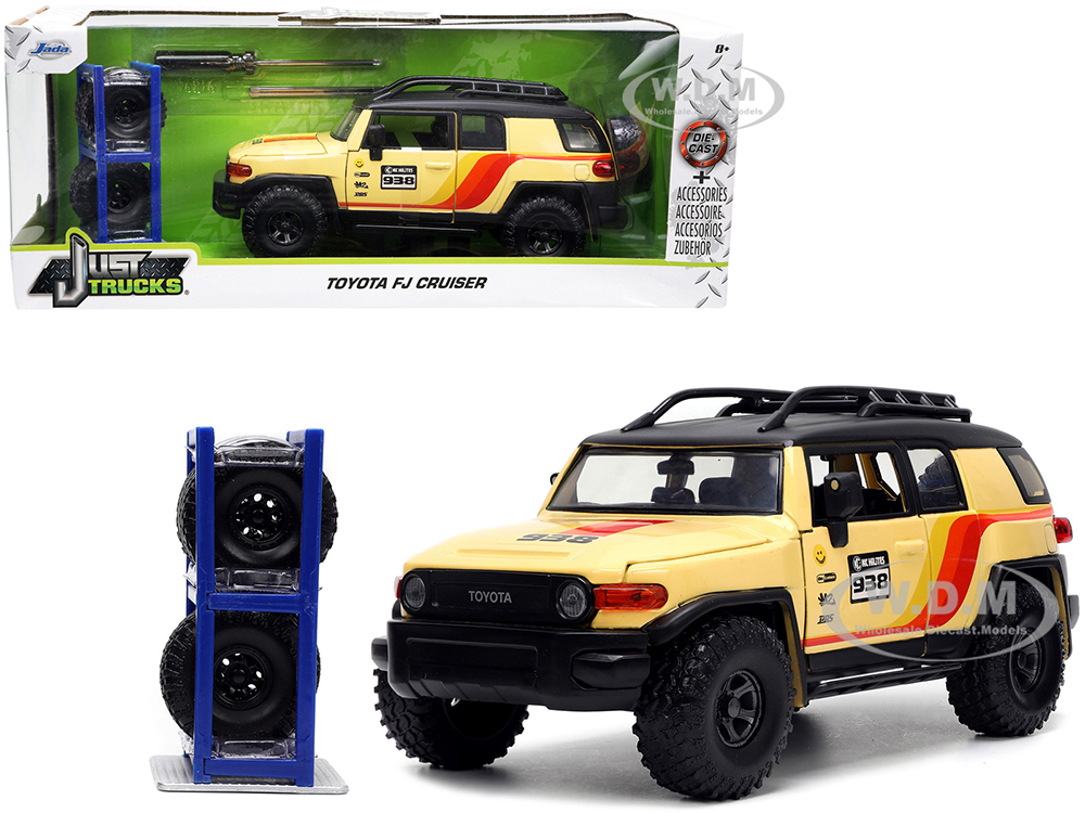 Toyota FJ Cruiser 938 Cream with Matt Black Top with Roof Rack and Stripes "KC Hilites" with Extra Wheels "Just Trucks" Series 1/24 Diecast Model Car