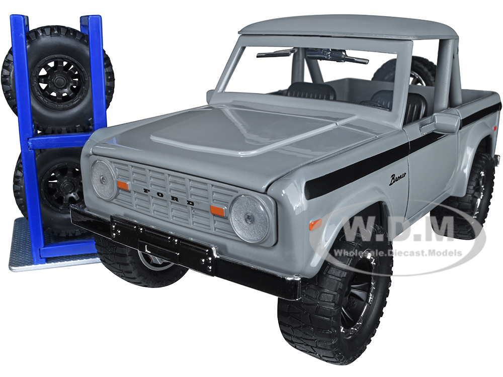 1973 Ford Bronco Pickup Truck Gray with Black Stripes with Extra Wheels Just Trucks Series 1/24 Diecast Model Car by Jada
