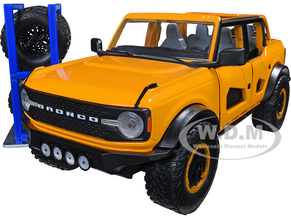 2021 Ford Bronco Orange Metallic with Extra Wheels "Just Trucks" Series 1/24 Diecast Model Car by Jada