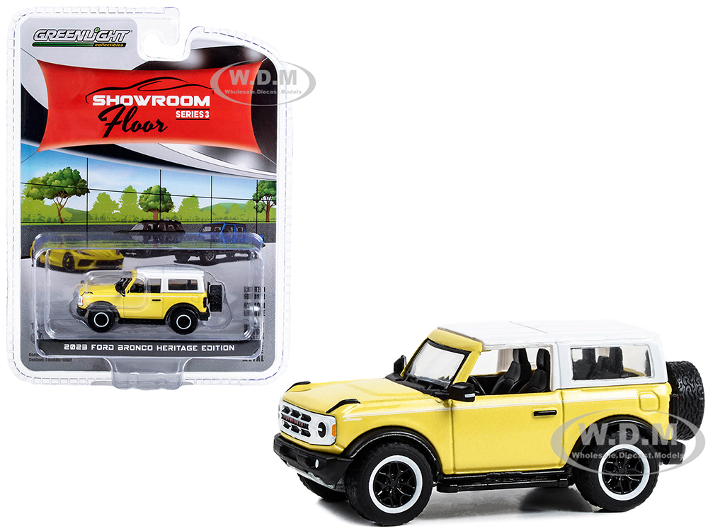 2023 Ford Bronco Heritage Edition Yellowstone Metallic with Oxford White Top Showroom Floor Series 3 1/64 Diecast Model Car by Greenlight