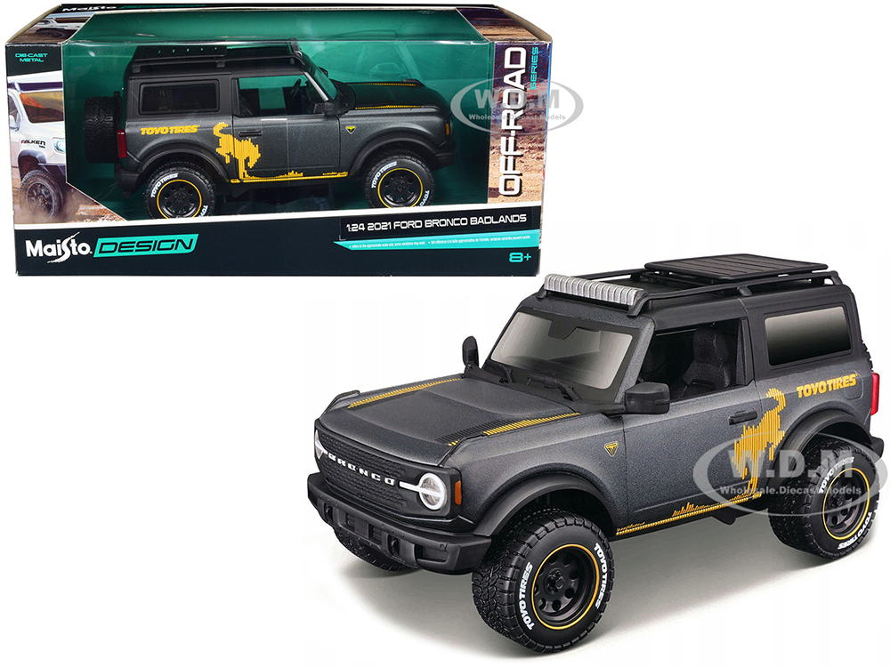 2021 Ford Bronco Badlands Dark Gray Metallic with Gold Graphics and Roof Rack Off-Road Maisto Design Series 1/24 Diecast Model Car by Maisto
