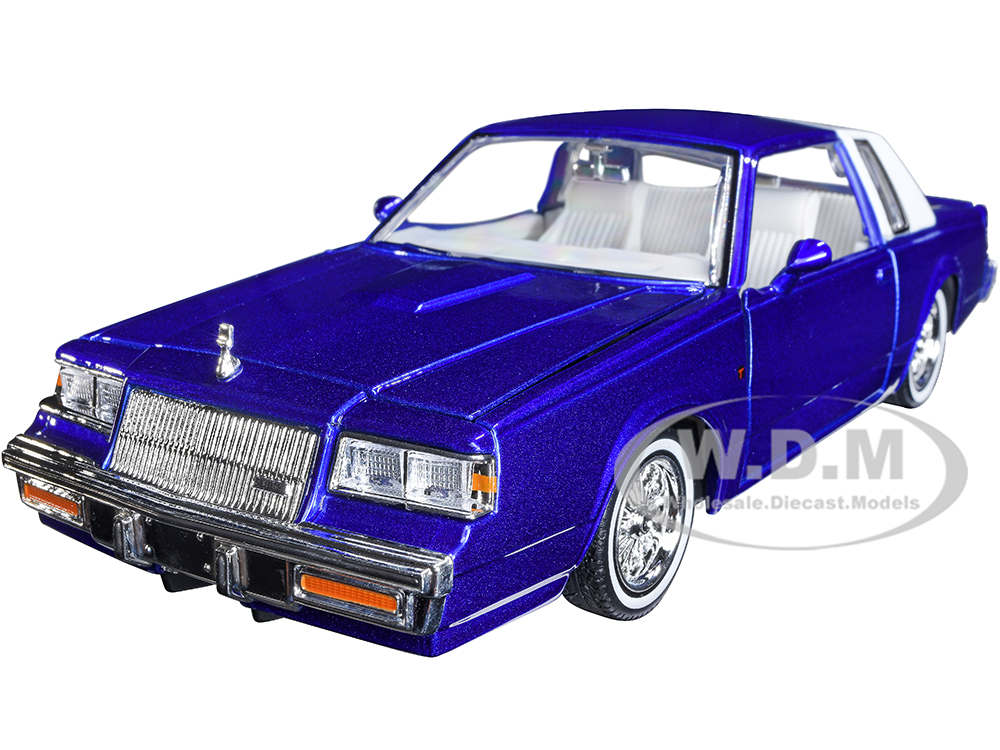 1987 Buick Regal Candy Blue Metallic with Rear Section of Roof White and White Interior "Get Low" Series 1/24 Diecast Model Car by Motormax