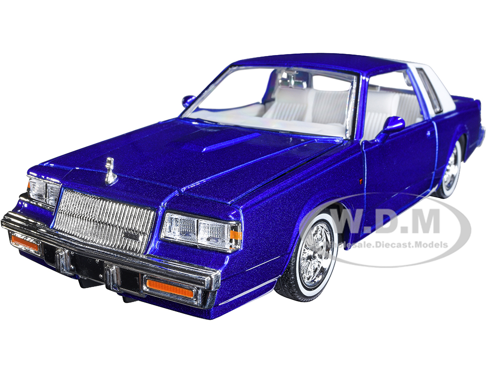 1987 Buick Regal Candy Blue Metallic with Rear Section of Roof White and White Interior 