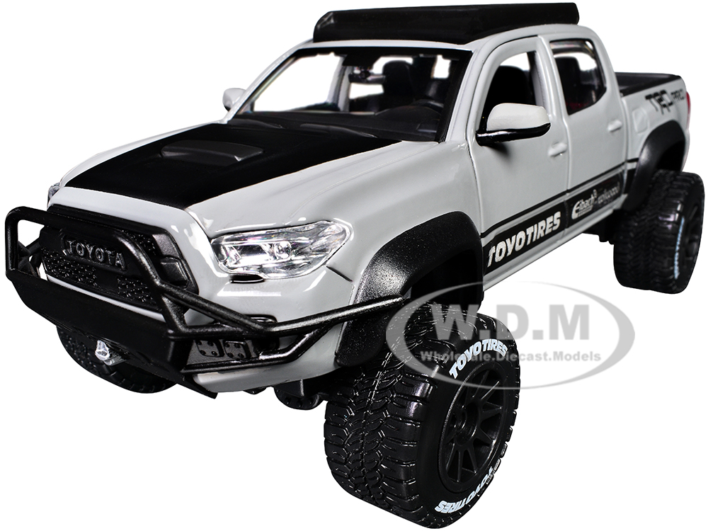 2023 Toyota Tacoma TRD PRO Off Road Pickup Truck Cement Gray with Black Hood and Roofrack Maisto Design Series 1/27 Diecast Model Car by Maisto