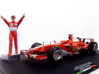 Ferrari 5 Michael Schumacher Winner F1 Formula One Monza Italian GP (2006) with Michael Schumacher Figurine 1/18 Diecast Model Car by Hot Wheels