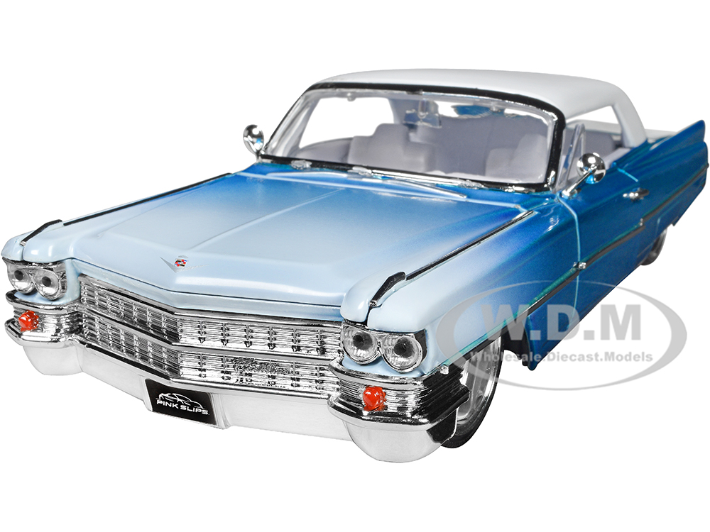 1963 Cadillac Coupe DeVille Blue Metallic and White Gradient with White Top and Interior 