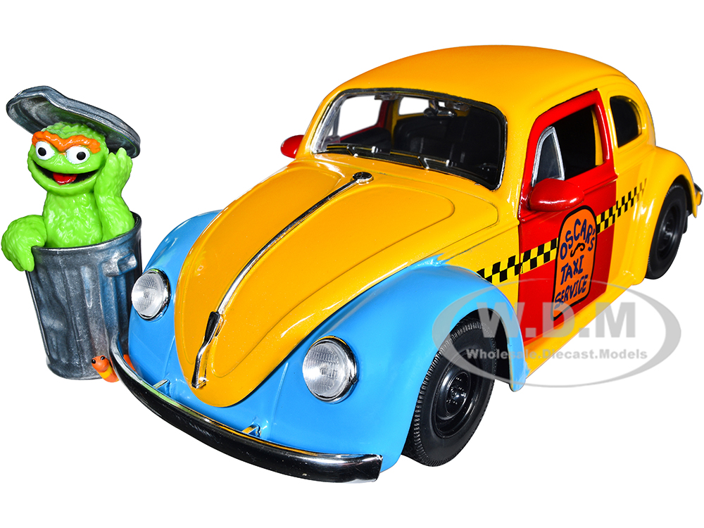 1959 Volkswagen Beetle Taxi Yellow and Blue "Oscars Taxi Service" and Oscar the Grouch Diecast Figure "Sesame Street" "Hollywood Rides" Series 1/24 D