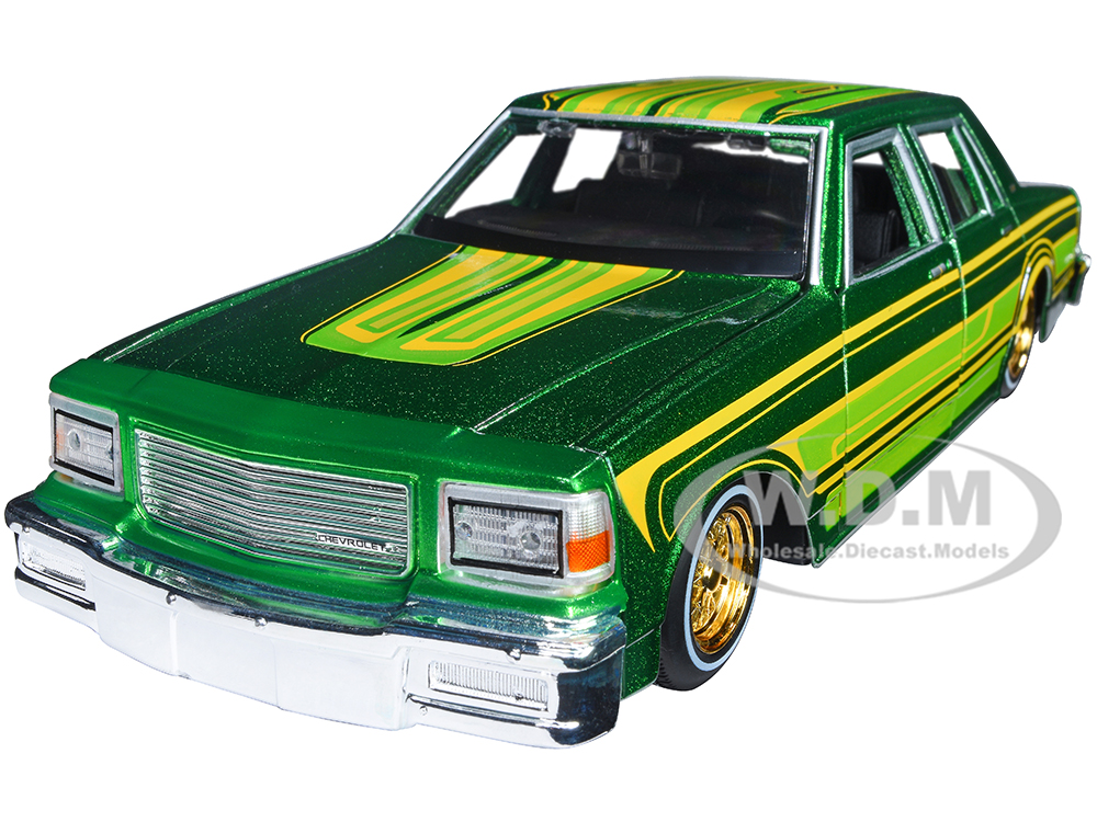 1987 Chevrolet Caprice Green Metallic with Graphics "Lowriders" "Classic Muscle" Series 1/26 Diecast Model Car by Maisto