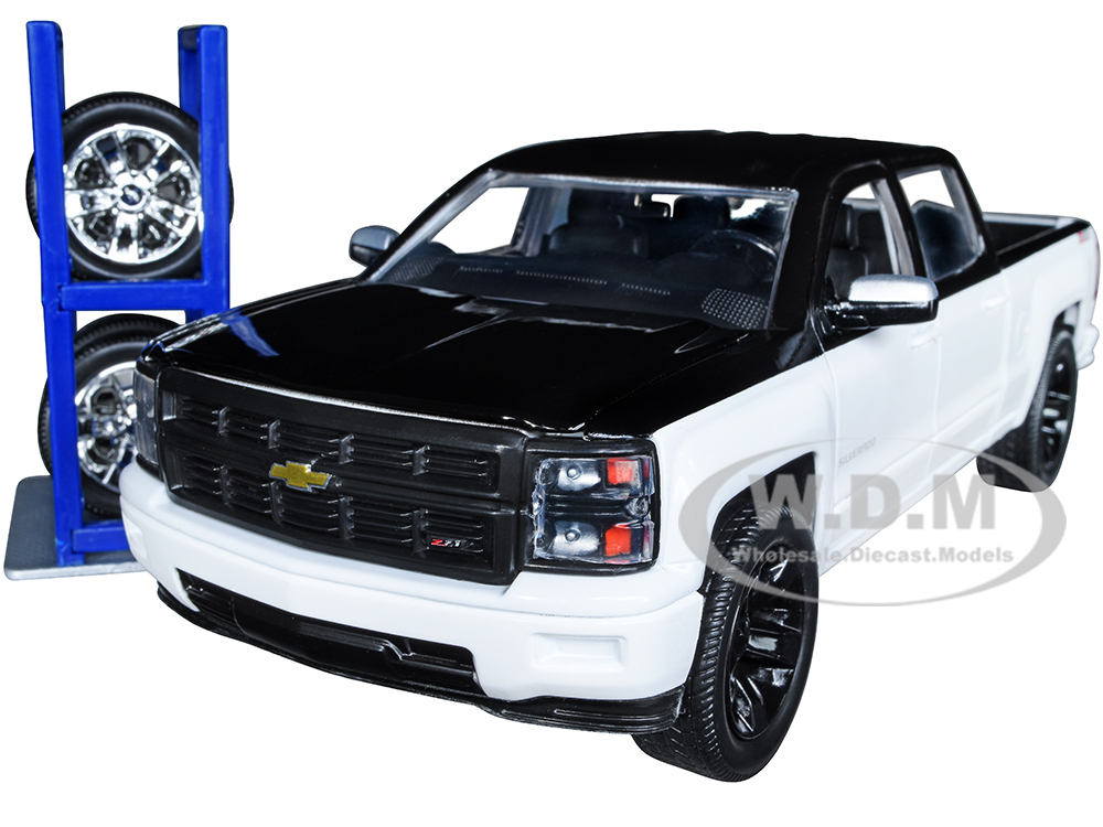 2014 Chevrolet Silverado Z71 Pickup Truck Black and White with Extra Wheels "Just Trucks" Series 1/24 Diecast Model Car by Jada