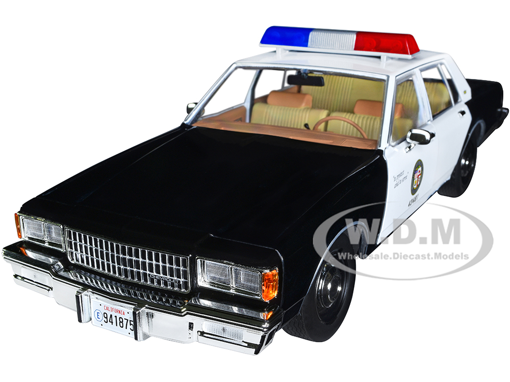 1986 Chevrolet Caprice Black and White LAPD (Los Angeles Police Department) "MacGyver" (1985-1992) TV Series "Artisan Collection" 1/18 Diecast Model