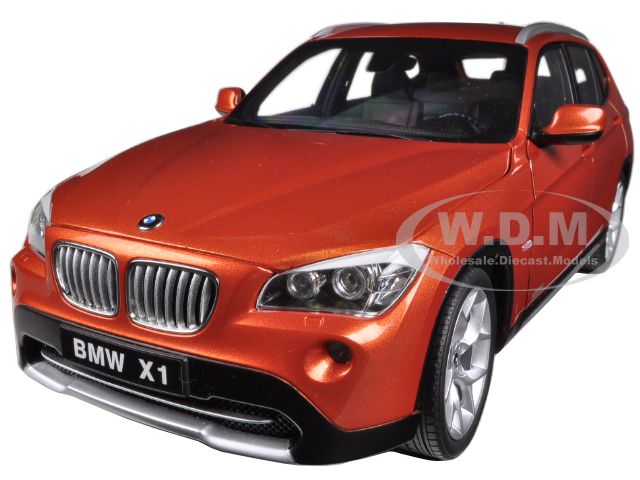 Image of BMW X1 xDrive 2.8i E84 Valencia Orange 1/18 Diecast Car Model by Kyosho