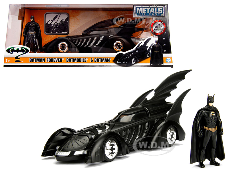 Brand new 1:24 scale diecast model car of 1995 Batman Forever Batmobile with diecast Batman Figure die cast car model by Jada.Rubber tires.Brand new box.Car includes 1 figure.Batman made of diecast metal.Detailed interior exterior.Made of diecast with some plastic parts.Dimensions approximately L-8 W-3.75 H-3.55 inches.