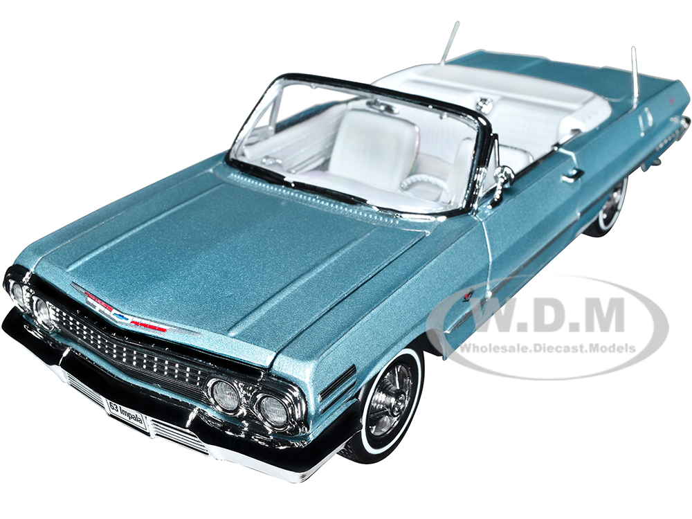 1963 Chevrolet Impala Convertible Light Blue Metallic with White Interior NEX Models 1/24 Diecast Model Car by Welly