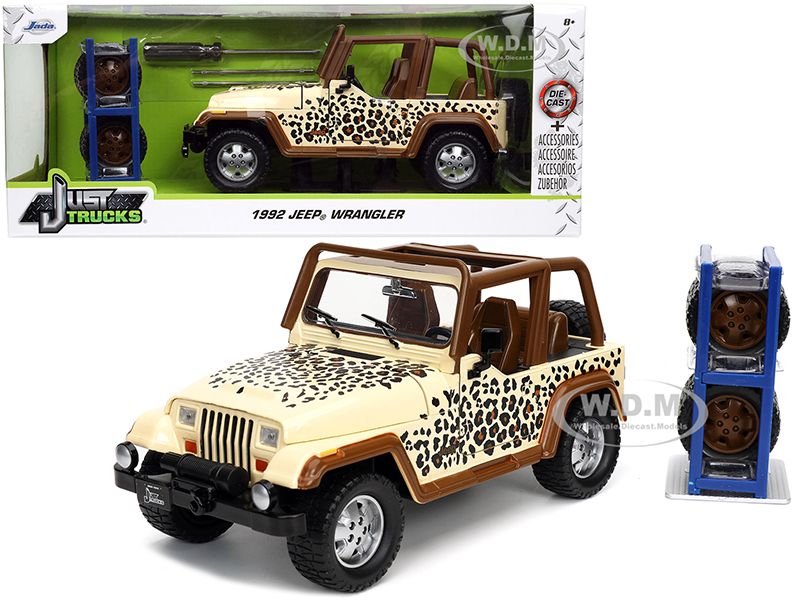 1992 Jeep Wrangler Tan And Brown With Graphics And Extra Wheels Just Trucks Series 1/24 Diecast Model Car By Jada