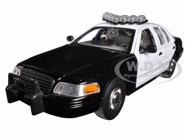 1999 Ford Crown Victoria Unmarked Police Car Black/White In Display Case with Light Bar and Push Bar 1/24 Diecast Model Car by Welly