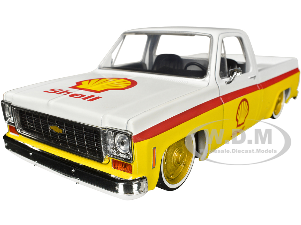 1973 Chevrolet Cheyenne 10 Pickup Truck White and Yellow with Red Stripes Shell Oil Limited Edition to 7050 pieces Worldwide 1/24 Diecast Model Car by M2 Machines