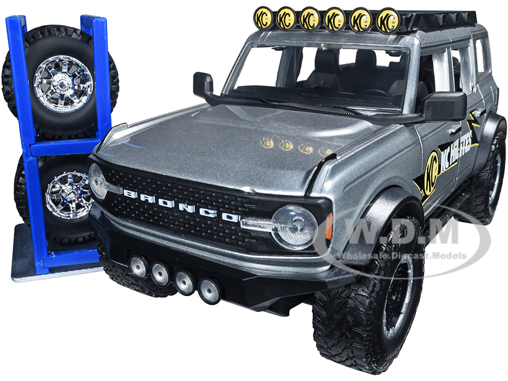 2021 Ford Bronco Gray Metallic KC HiLiTES with Extra Wheels Just Trucks Series 1/24 Diecast Model Car by Jada