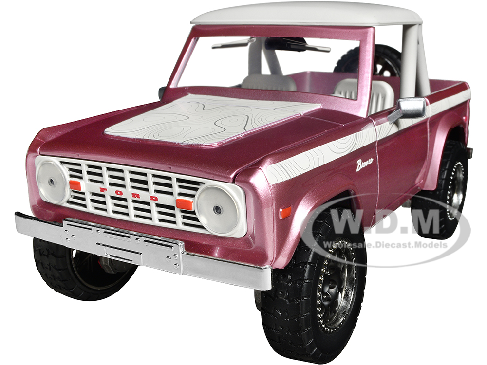 1973 Ford Bronco Pink Metallic with White Top and Graphics Pink Slips Series 1/24 Diecast Model Car by Jada